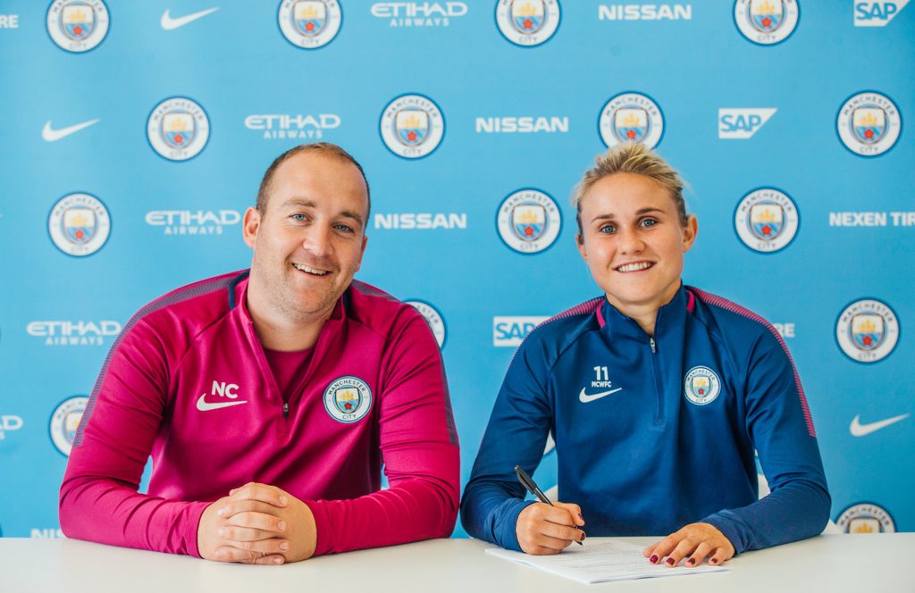 Manchester City's Izzy Christiansen signs a contract extension with Nick Cushing