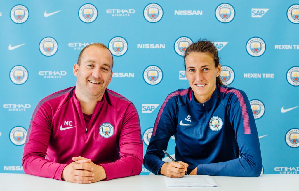 Manchester City's Jill Scott signs a contract extension with Nick Cushing