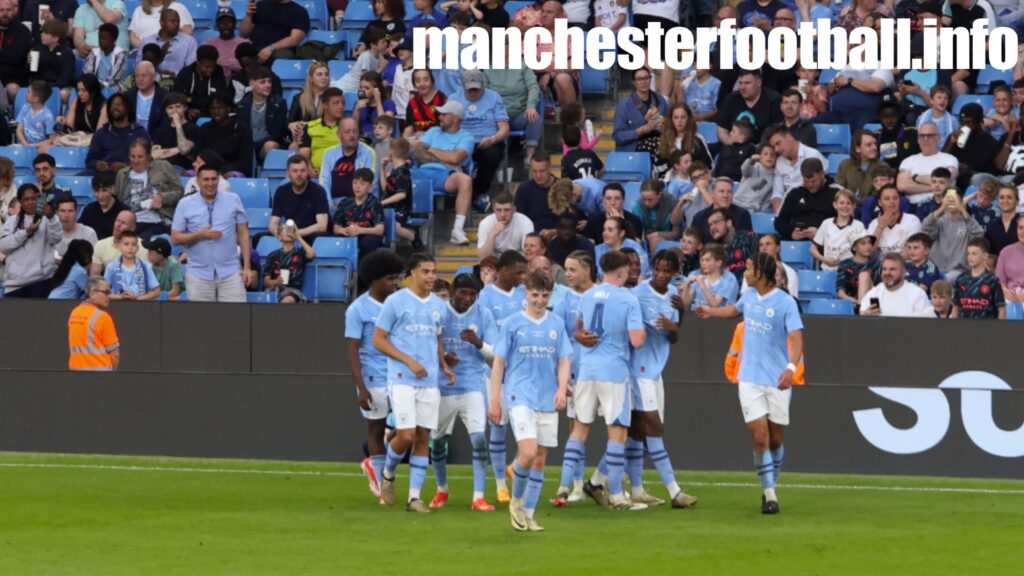 Manchester City players celebrate Stephen Mfuni's goal in the FA Youth Cup final 2024 played at the Etihad Stadium against Leeds United on Friday May 10 2024